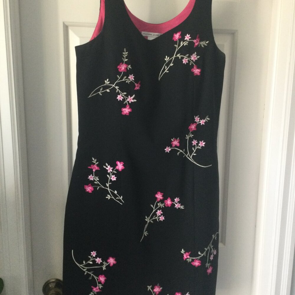 Beautiful black sheath with embroidered flowers.